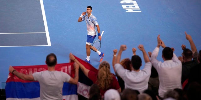 Novak Djokovic of Serbia reacts after winning the first set against Tommy Paul of the U.S. during their semifinal at the Australian Open tennis championship in Melbourne, Australia, Friday, Jan. 27, 2023.