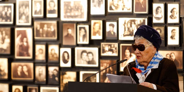 Holocaust survivor, Zdzislawa Wlodarczyk, delivers a speech during a ceremony in the former Nazi German concentration and extermination camp Auschwitz during ceremonies marking the 78th anniversary of the liberation of the camp in Brzezinka, Poland, Friday, Jan. 27, 2023. 