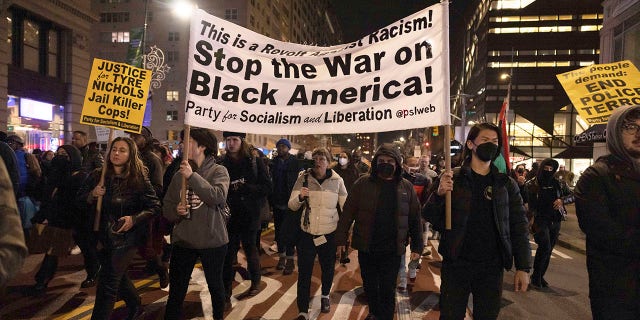 Demonstrators march during a protest Saturday, Jan. 28, 2023, in New York, in response to the death of Tyre Nichols, who died after being beaten by Memphis police during a traffic stop.