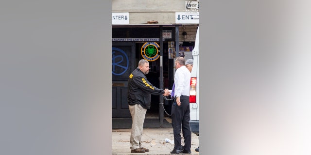 Investigators are seen outside of Reggie’s bar in Baton Rouge, Louisiana on Tuesday, January 24, 2023. The bar is reportedly one of the last places where LSU student, Madison Morgan was seen before her death on January 15.