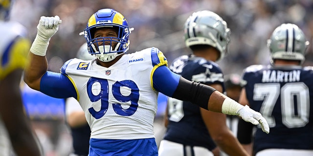 Defensive tackle Aaron Donald #99 of the Los Angeles Rams reacts after a tackle against the Dallas Cowboys in the first half of a NFL football game at SoFi Stadium in Inglewood on Sunday, October 9, 2022.