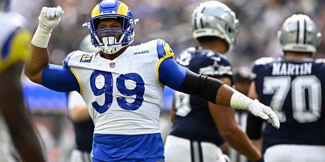 Defensive tackle Aaron Donald #99 of the Los Angeles Rams reacts after a tackle against the Dallas Cowboys in the first half of a NFL football game at SoFi Stadium in Inglewood on Sunday, October 9, 2022.