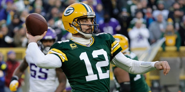 Packers quarterback Aaron Rodgers throws a pass against the Minnesota Vikings, Sunday, Jan. 1, 2023, in Green Bay, Wisconsin.