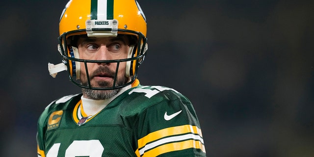 Aaron Rodgers, #12 of the Green Bay Packers, warms up before a game against the Detroit Lions at Lambeau Field on Jan. 8, 2023 in Green Bay, Wisconsin.