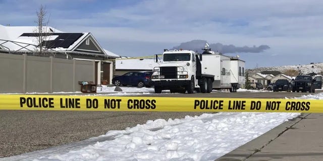 Police continue their investigation at a home where eight family members were found dead in Enoch, Utah, Thursday, Jan. 5, 2023. Officials said Michael Haight, 42, took his own life after killing his wife, mother-in-law and the couple's five children. 