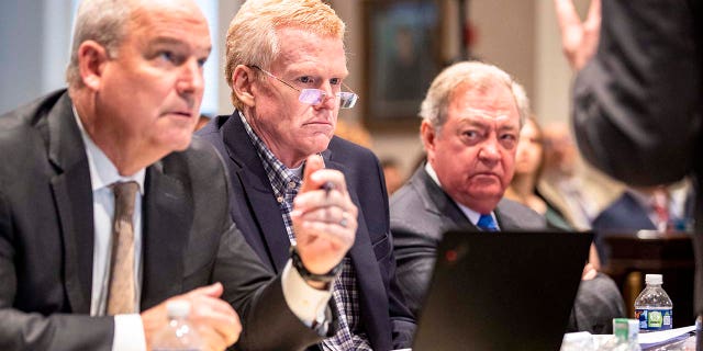 Defense attorney Jim Griffin, Alex Murdaugh and Dick Harpootlian listen to Creighton Waters in the double murder trial of Alex Murdaugh at the Colleton County Courthouse in Walterboro, Monday, Jan. 30, 2023.