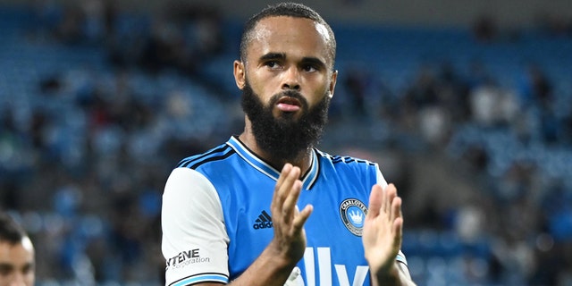 Charlotte FC defender Anton Walkes greets fans after their draw against Columbus Crew at Bank of America Stadium on October 5, 2022.