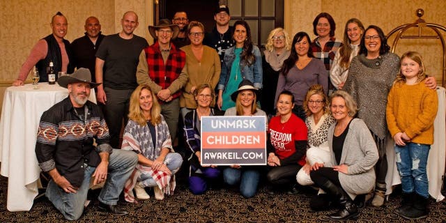 Members of education activism group Awake Illinois pose at event. Photo provided by Shannon Adcock, president and founder of Awake Illinois.