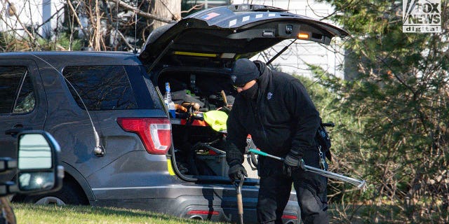 Police/investigators bringing equipment into Walshe home at 516 Chief Justice Cushing Highway, Cohasset, MA, after Brian Walshe and children departed.