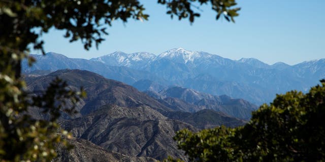 Snow-covered Mount Baldy is visible from Mt. Disappointment Road in the San Gabriel Mountains.