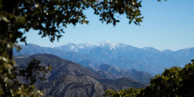 Snow-covered Mount Baldy is visible from Mt. Disappointment Road in the San Gabriel Mountains.