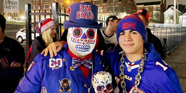 Buffalo Bills fans gather outside the hospital to support Damar Hamlin after she collapsed during a game against the Cincinnati Bengals in Ohio Monday night.