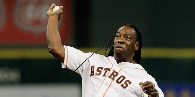 WWE Superstar Booker T throws out the first pitch at Minute Maid Park July 29, 2014, in Houston.  