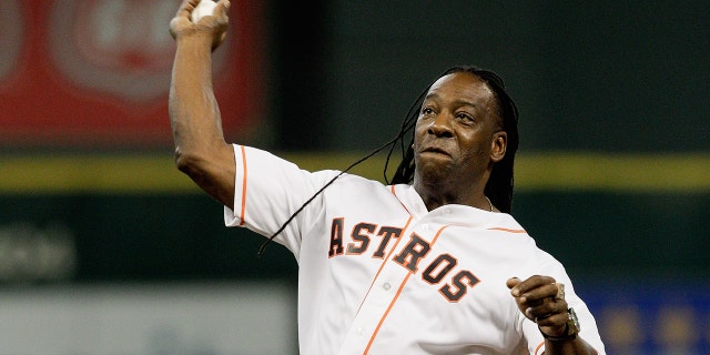 WWE Superstar Booker T throws out the first pitch at Minute Maid Park July 29, 2014, in Houston.