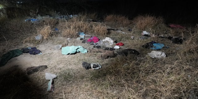 Clothes, shoes and garbage litter the southern border near Eagle Pass, Texas.