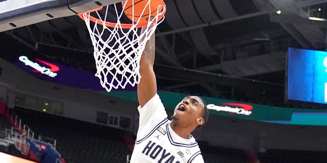 Brandon Murray, #0 of the Georgetown Hoyas, dunks the ball in the first half during a basketball game against the Villanova Wildcats at the Capital One Arena on Jan. 4, 2023 in Washington, D.C.