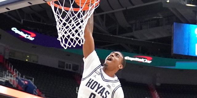 Brandon Murray, #0 of the Georgetown Hoyas, dunks the ball in the first half during a basketball game against the Villanova Wildcats at the Capital One Arena on Jan. 4, 2023 in Washington, D.C.