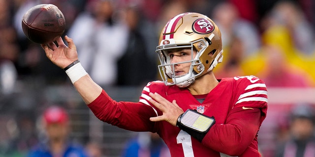 San Francisco 49ers quarterback Brock Purdy passes during the second half of an NFL wild-card playoff game against the Seattle Seahawks on Saturday, Jan. 14, 2023, in Santa Clara, Calif.
