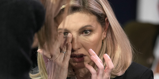 First lady of Ukraine Olena Zelenska reacts at the World Economic Forum in Davos, Switzerland, after the news of a helicopter crash in Ukraine that killed Minister of Internal Affairs Denys Monastyrskyi and others on Wednesday, Jan. 18.