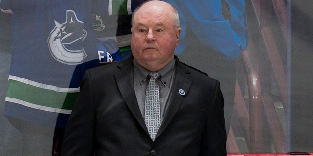 Canucks head coach Bruce Boudreau watches warmups before the Colorado Avalanche game at Rogers Arena on Jan. 20, 2023, in Vancouver, Canada.