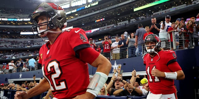 Tom Brady (12) of the Tampa Bay Buccaneers takes the field before a game against the Dallas Cowboys at AT and T Stadium Sept. 11, 2022, in Arlington, Texas.