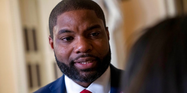 FILE: Rep. Byron Donalds, R-Fla., is interviewed on his way to the House chamber, Friday, Jan. 6, 2023, to attend the 14th vote for speaker of the House, on Capitol Hill in Washington. 