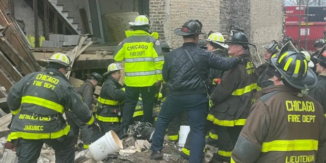 Person trapped following building collapse in Chicago has been pulled out.