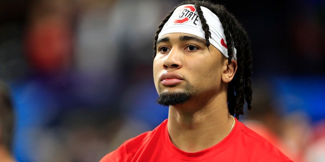 Ohio State Buckeyes quarterback CJ Stroud (7) warms up before the college football playoff semifinal game between the University of Georgia Bulldogs and the Ohio State Buckeyes on December 31, 2022 at Mercedes-Benz Stadium in Atlanta.