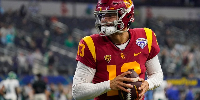 Caleb Williams warms up before the Cotton Bowl, Monday, Jan. 2, 2023, in Arlington, Texas.