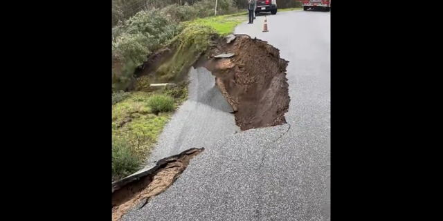 The road then starts accelerating as it slides down a hill near Pescadero, California.