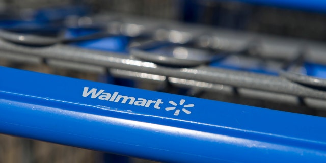 The Walmart Stores Inc. logo is displayed on a shopping cart standing in front of a location in American Canyon, California, Feb. 16, 2012. 