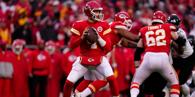 Chad Henne (4) of the Kansas City Chiefs looks to throw a pass against the Jacksonville Jaguars during the second quarter in an AFC divisional playoff game at Arrowhead Stadium Jan. 21, 2023, in Kansas City, Mo.