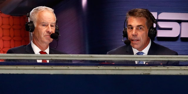 John McEnroe, left, and Chris Fowler call a match at the U.S. Open on Aug. 27, 2018, in New York.