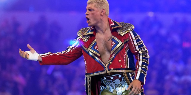 Apr 2, 2022; Arlington, TX, USA; Cody Rhodes enters the arena during WrestleMania at AT&T Stadium.