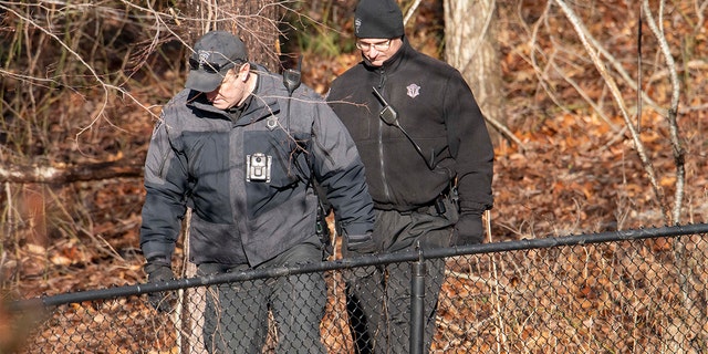 Officers search Ana Walshe's property in Cohasset, Mass., Saturday, Jan. 7, 2023.