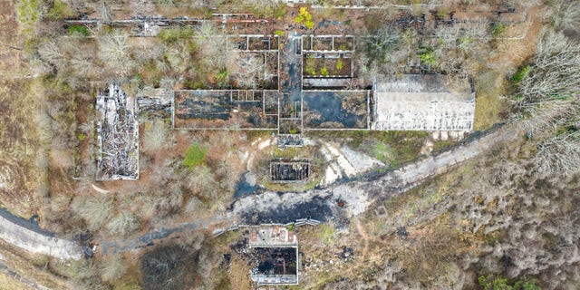 In this aerial view, a structure sits on land owned by the city of Atlanta, Thursday, Jan. 26, 2023, in unincorporated DeKalb County.