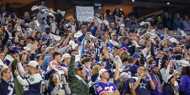 Dallas Cowboys fans cheer on their team during the game between the Dallas Cowboys and the New York Giants on Nov. 24, 2022 at AT&amp;T Stadium in Arlington, Texas.