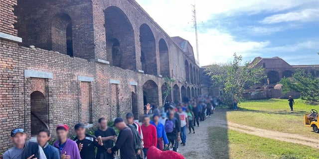 Migrants in the Dry Tortugas National Park after a weekend of multiple boat landings that saw many come to Florida. Over the weekend, hundreds of migrants landed in the Florida Keys.