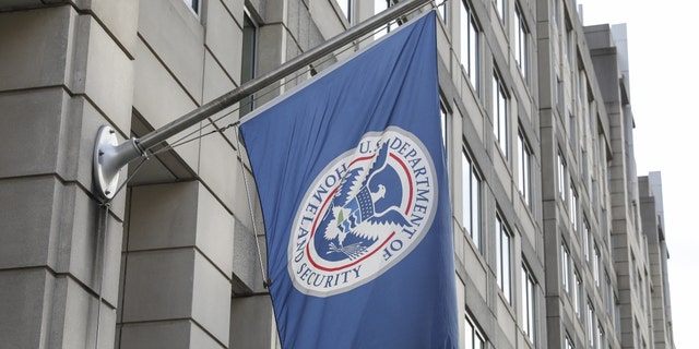 The flag of the U.S. Department of Homeland Security is seen on the U.S. Immigration and Customs Enforcement (ICE) building in Washington, DC, January 5, 2023. 