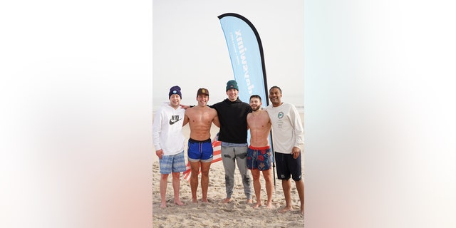 From left to right, Hartford Funding mortgage loan originator Brandon Kenney, Sunday Swim co-owners Nick Pfeiffer, Brett Scher and Brendan Cooke, and Hartford Funding mortgage loan originator Kevan Scott; they oversee the Sunday Swim project.