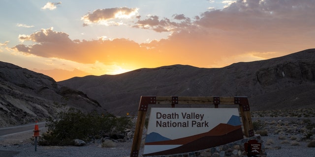 The Death Valley National Park welcome sign is seen during sunset in Death Valley, California, on Aug. 24, 2022.