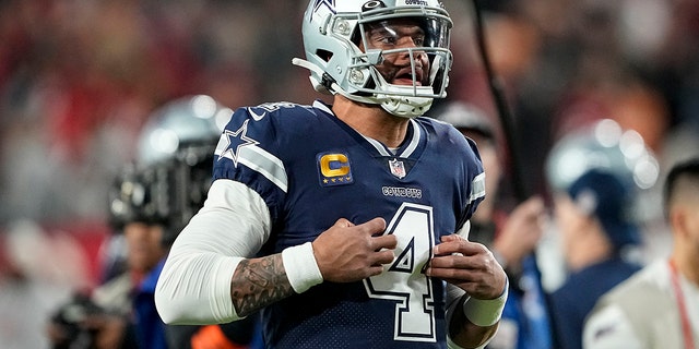 Dallas Cowboys quarterback Dak Prescott (4) warms up before an NFL Wild Card game against the Tampa Bay Buccaneers, Monday, Jan. 16, 2023, in Tampa, Florida.