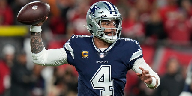 Dallas Cowboys quarterback Dak Prescott (4) passes the ball against the Tampa Bay Buccaneers during the first half of an NFL Wild Card game against the Tampa Bay Buccaneers, Monday, Jan. 16, 2023, in Tampa, FL.