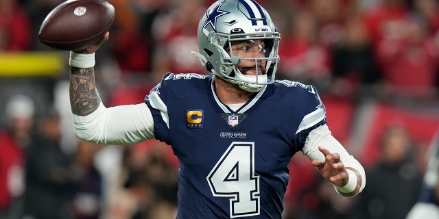 Dallas Cowboys quarterback Dak Prescott (4) passes the ball against the Tampa Bay Buccaneers during the first half of an NFL Wild Card game against the Tampa Bay Buccaneers, Monday, Jan. 16, 2023, in Tampa, FL.