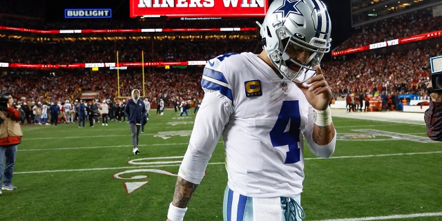 Dallas Cowboys quarterback Dak Prescott, #4, walks off the field after an NFL divisional round playoff football game against the San Francisco 49ers in Santa Clara, California, Sunday, Jan. 22, 2023.