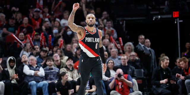 Damian Lillard #0 of the Portland Trail Blazers gestures after making a three point basket during the second half against the Utah Jazz at Moda Center on January 25, 2023, in Portland, Oregon.