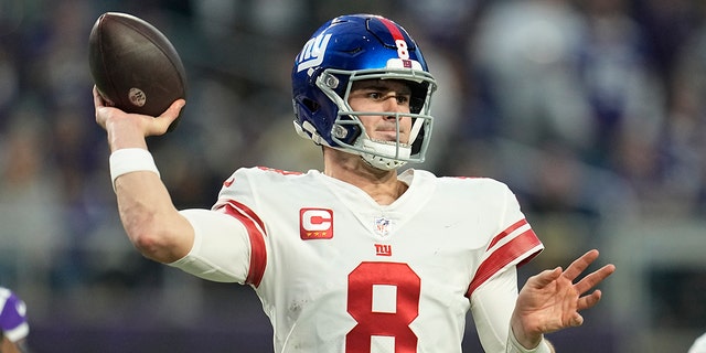 Sunday, Jan.  15, 2023, New York Giants' Daniel Jones throws during the first half of an NFL Wild Card football game against the Minnesota Vikings in Minneapolis.
