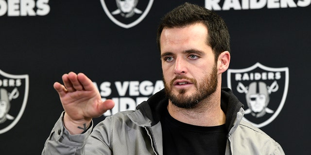 Las Vegas Raiders quarterback Derek Carr meets with reporters after the Steelers game in Pittsburgh, Dec. 24, 2022.