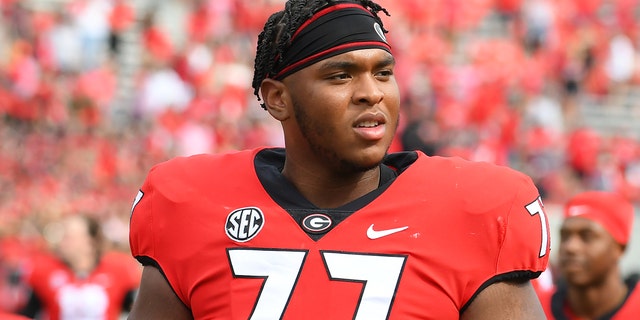 Georgia Bulldogs offensive lineman Devin Willock (77) after the college football game between the Arkansas Razorbacks and the Georgia Bulldogs on October 2, 2021, at Sanford Stadium in Athens, Georgia.