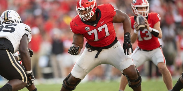 Devin Willock, #77 of the Georgia Bulldogs, in a fight against the Vanderbilt Commodores at Sanford Stadium on October 15, 2022 in Athens, Georgia.